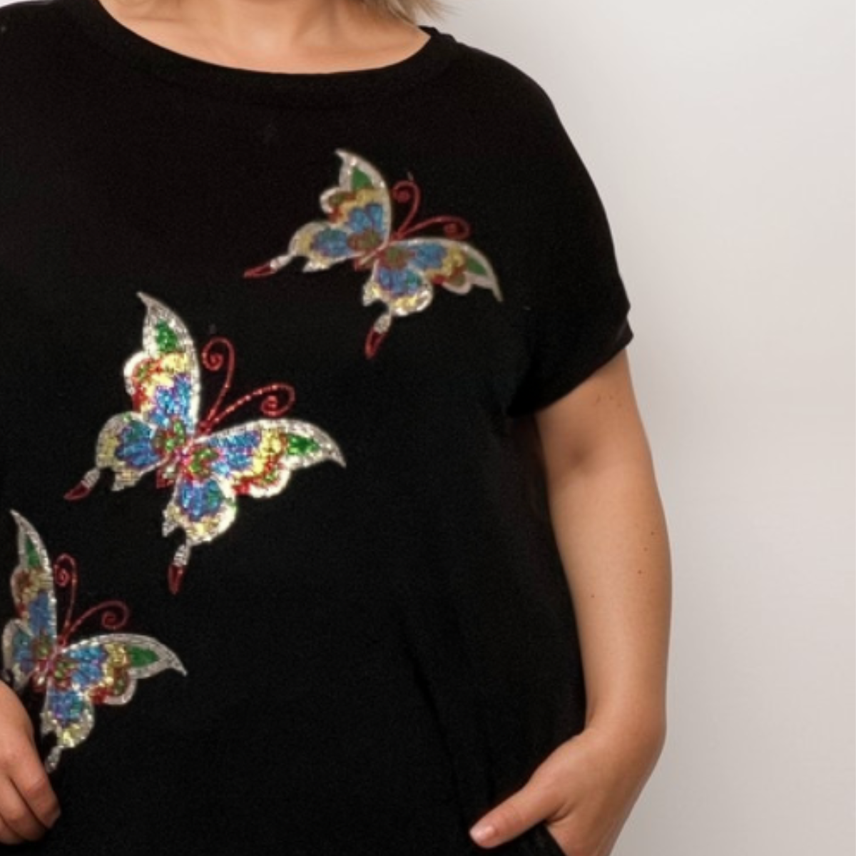 Sequin Butterfly Dipped Hem Top with Pockets