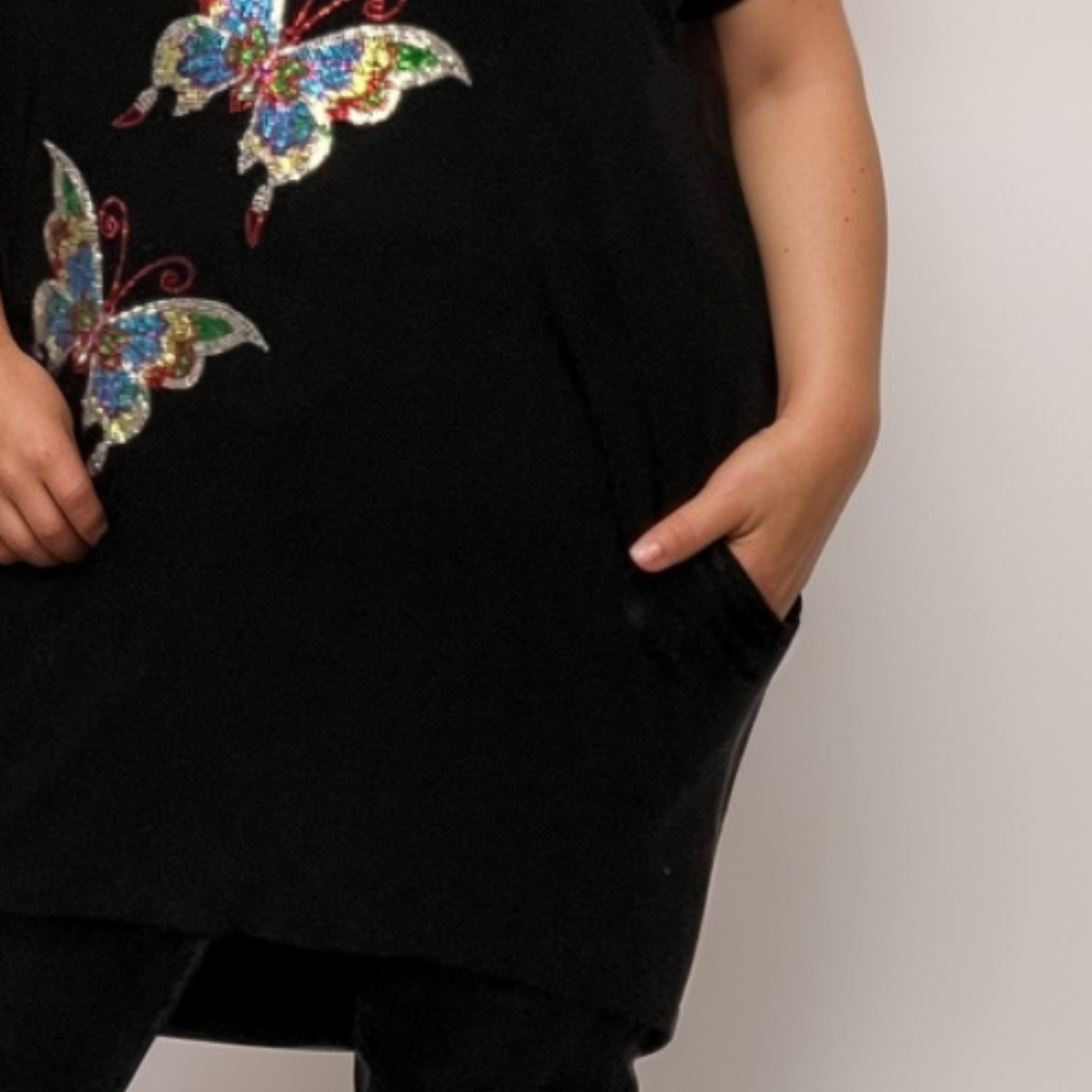 Sequin Butterfly Dipped Hem Top with Pockets